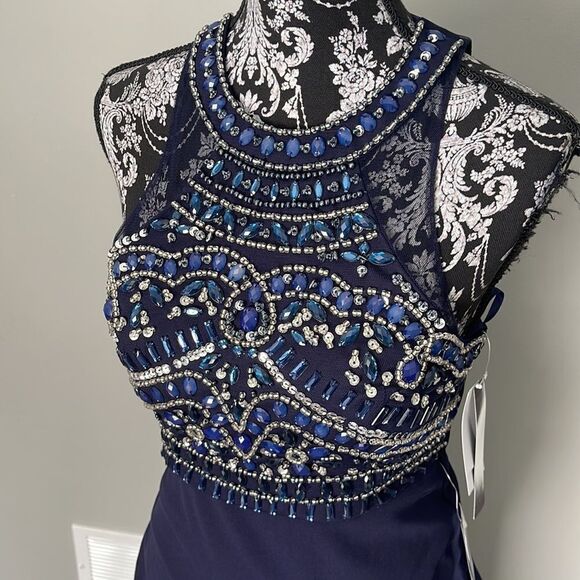 Sequin Hearts
Two-Piece Beaded Halter with Solid Skirt NEW - Picture 2 of 5